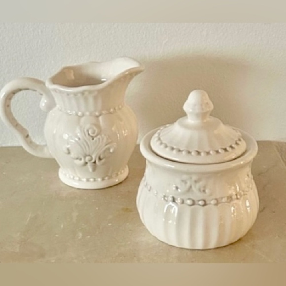 American Atelier “Baroque” Creamer and sugar bowl.